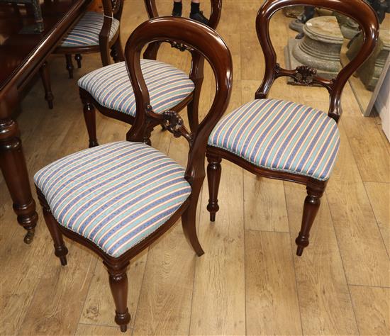 A set of eight Victorian style mahogany balloon back dining chairs